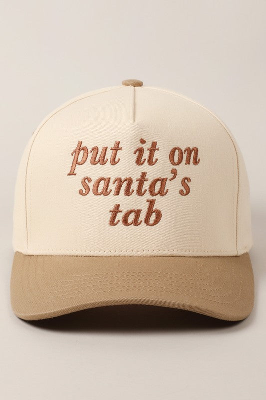 Funny holiday trucker hat with "Put It On Santa’s Tab" embroidered text.
Green and red festive hat perfect for Christmas parties.
Adjustable cotton hat with playful holiday design.