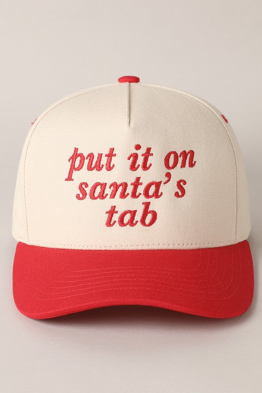 Funny holiday trucker hat with "Put It On Santa’s Tab" embroidered text.
Green and red festive hat perfect for Christmas parties.
Adjustable cotton hat with playful holiday design.